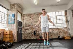 Low angle view of man doing skipping
