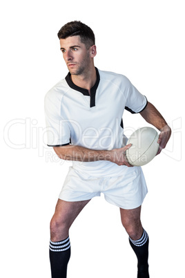 Rugby player defending the ball