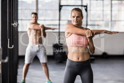 Two fit people doing fitness