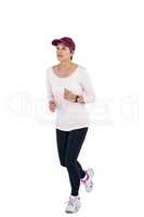 Mature woman wearing cap jogging