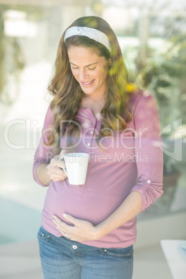 Happy woman with coffee mug