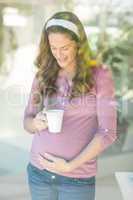 Happy woman with coffee mug