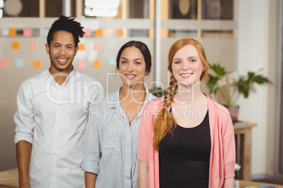 Portrait of smiling business people in office