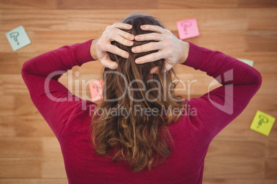 Man with hands standing in front of sticky notes