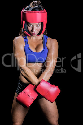 Portrait of fit female boxer