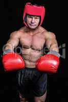 Portrait of boxer with red gloves and headgear