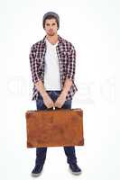 Portrait of confident man holding briefcase