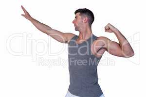 Fit man posing as he works out