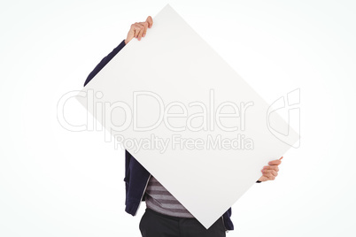 Man holding billboard in front of face