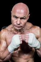 Portrait of bald fighter with bandage