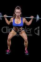 Portrait full length of woman lifting crossfit