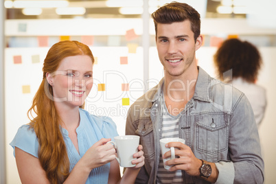 Portrait of business people having coffee break