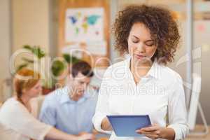 Businesswoman using digital tablet