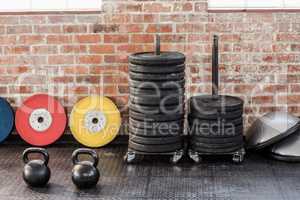 kettlebells in front of weights and bossu