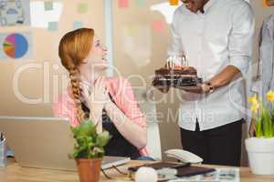 Happy businesswoman celebrating birthday