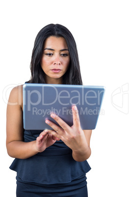 Concerned woman using her tablet