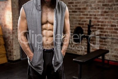 Midsection of man wearing hood