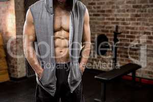 Midsection of man wearing hood