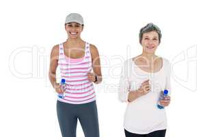Happy women with bottle jogging