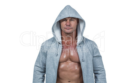Portrait of macho man in hood