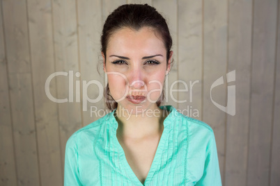 Portrait of woman making face