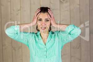 Portrait of woman suffering from headache