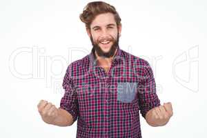 Portrait of successful hipster with clenched fist