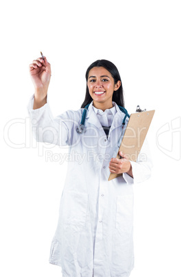 Smiling doctor holding a clipboard