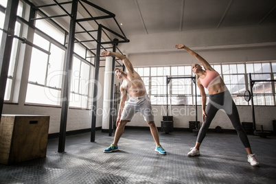 Two fit people doing fitness