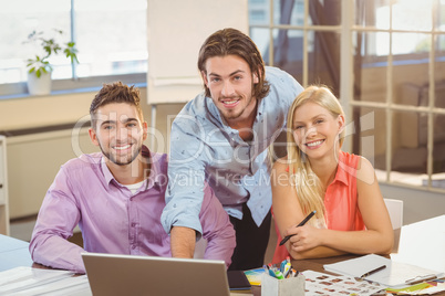 Confident business people working in office