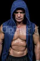 Muscular man in blue hood