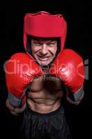 Angry boxer with gloves and headgear