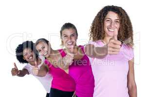 Portrait of smiling women with thumbs up