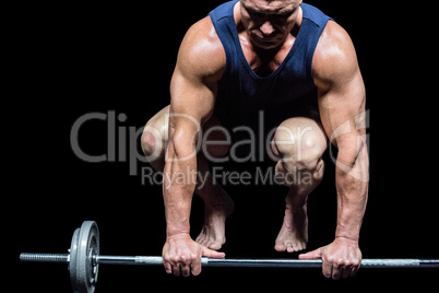 Muscular man lifting crossfit