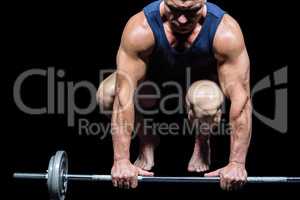 Muscular man lifting crossfit