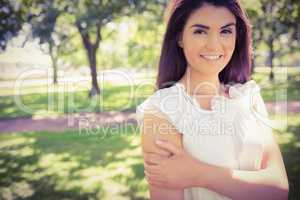 Portrait of smiling confident woman in park