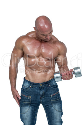 Bald man lifting dumbbells