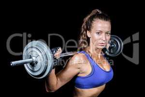 Portrait of fit woman lifting crossfit