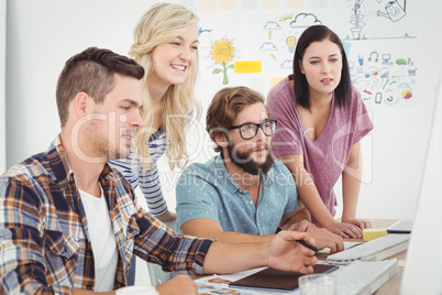 Business people working at computer desk