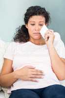 Unhappy woman with tissue crying