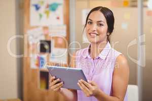 Businesswoman holding digital tablet