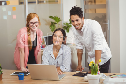 Portrait of happy business people in office Portrait of happy business people in office