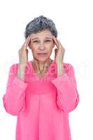 Portrait of mature woman suffering from headache