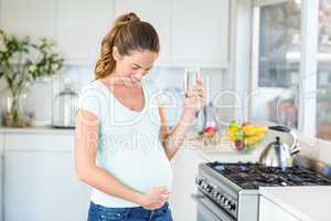 Happy woman holding water