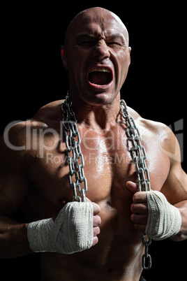 Aggressive fighter holding chain