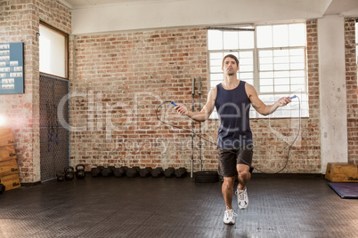 Man skipping wearing sportswear