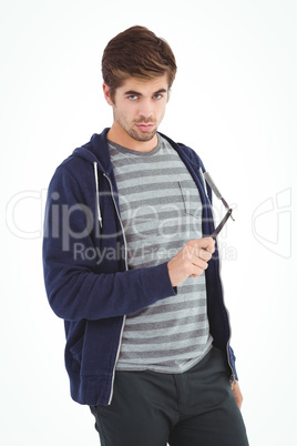 Portrait of confident man holding straight edge razor