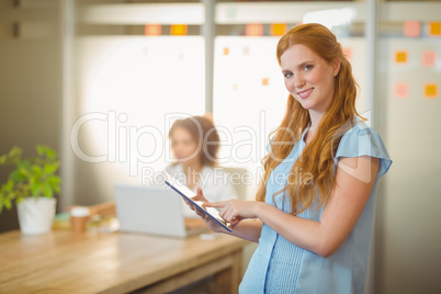 Businesswoman using digital PC