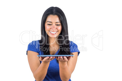 Cute woman holding a tablet pc in her hands