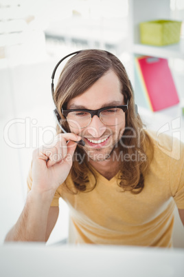 Happy hipster using microphone